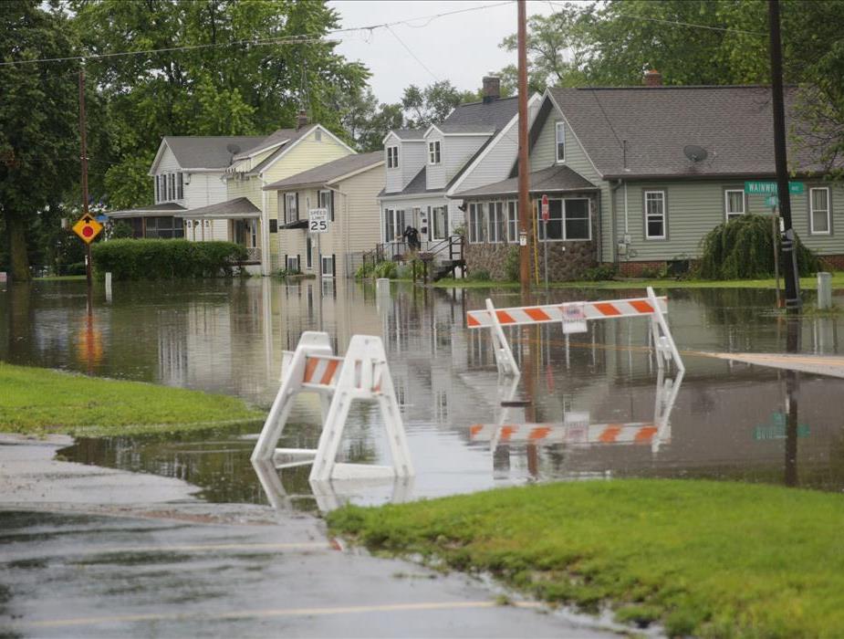 Street View of a Neighborhood with streets flooded